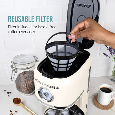Classic Retro 10 Cup Drip Coffee Maker With One Touch Brew Reusable Filter Auto Shutoff Time Display Anti Drip Dishwasher Safe 50 Ounce Carafe Cream Finish Coffee Machine For Quick Mornings with reusable filter being placed inside.