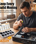 Person using Beefed Up 400 Piece Pc Screw And Standoff Hardware Kit With Heavy Duty Black Zinc Plated Spacers for PC building.