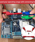 Hands using 30 Piece Silicone Banana Plug Test Leads Kit With 4mm Stackable Banana Plugs on a circuit board.