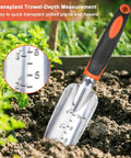 Heavy Duty Garden Tools Set 3 Piece With Ergonomic Handles Shovel Transplant Trowel And Hand Rake Aluminum Alloy Orange For Planting Weeding Digging And Lawn Care showing transplant trowel with depth scale placed in soil