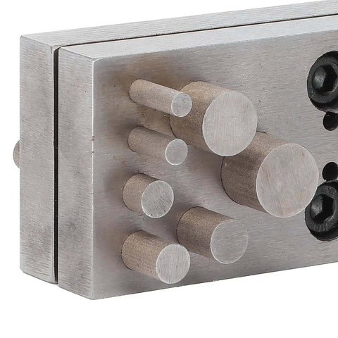 Close-up of Disc Cutter Punch Set 14Pcs for Jewelry Making and Metal Gasket Punching showing flat bottom die cutter with five hole sizes.
