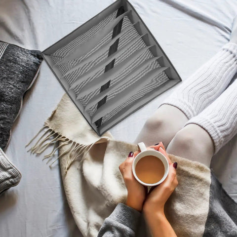 Multi Compartment Foldable Linen Drawer Organizer Box For Bras And Socks Keeps Your Closet Stash Secure With Heavy Duty Fabric Storage shown on a cozy blanket.