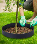 236 Ft Garden Landscape Edging Kit With 2 Inch Tall Border 216 Anchoring Spikes 21 Connectors Flexible Plastic Border installed around tree