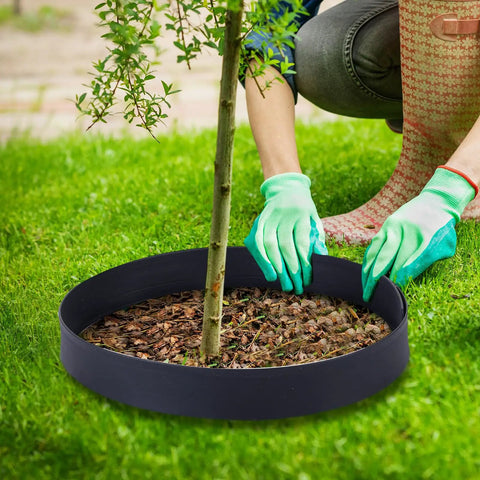 236 Ft Garden Landscape Edging Kit With 2 Inch Tall Border 216 Anchoring Spikes 21 Connectors Flexible Plastic Border installed around tree