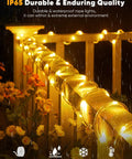 Solar Rope Lights 39Ft 100LED Outdoor String Lights IP65 Waterproof, 8 Lighting Modes, Warm White wrapped around a garden fence