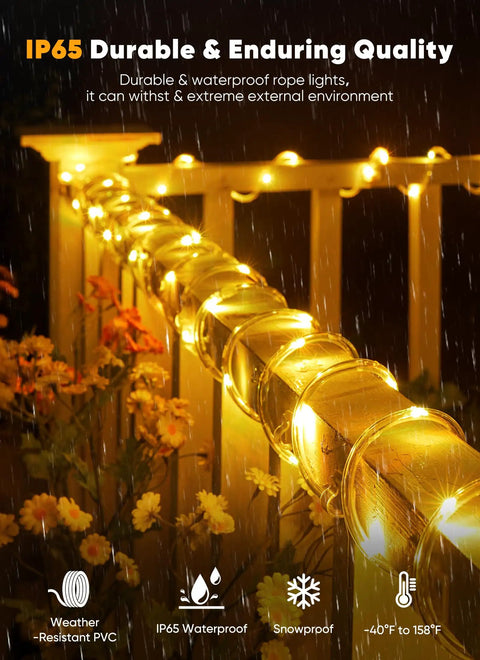 Solar Rope Lights 39Ft 100LED Outdoor String Lights IP65 Waterproof, 8 Lighting Modes, Warm White wrapped around a garden fence