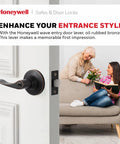 Interior And Exterior Wave Lever Door Handle With Keys For Bedroom Security Top Notch No Fuss Anti Bump Resistant Reversible For Right Or Left Sided Doors In Polished Brass Grade 3 ANSI Certified Includes Two Keys in oil rubbed bronze installed on white door in living room setting with people on sofa.