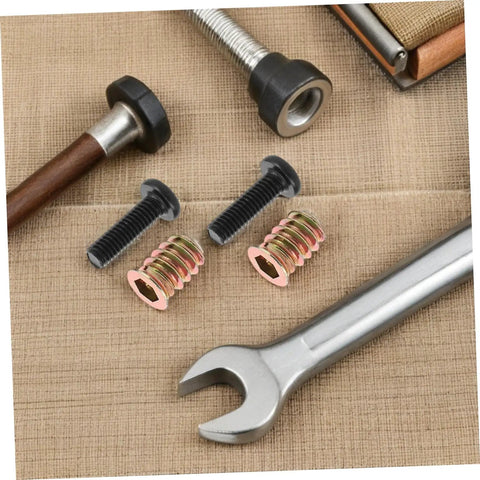 Close-up of 50Pc Wood Threaded Insert Nut Kit with Hex Bolts for DIY Furniture Assembly, showing inserts, bolts, and wrench.