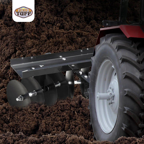 Tow Behind Sleeve Hitch Disc Harrow Garden Cultivator attached to tractor with 39-inch working width and 11-inch black steel discs