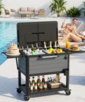 104 Quart Rolling Cooler With Wheels For Backyard Parties Outdoor Bbq Tailgates And Camping Heavy Duty Portable Ice Chest On Wheels With Easy Pull Handle Holds Up To 100 Cans And Ice Gray near a pool with drinks and snacks