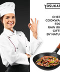 Chef holding Flat Bottom Carbon Steel Wok Pan 11.8 Inch Pre Seasoned For Stir Fry And Outdoor Cooking