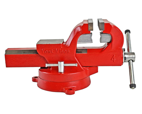 Badass 6 Inch Heavy Duty Bench Vise With Smooth 360 Degree Swivel Base And Serrated Pipe Jaws Built Tough From Rock Solid Austempered Iron, red color, side view.