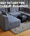 Heavy Duty Couch Connectors For Sliding Sectional Sofas 4 Pack Easy Hook And Loop Cinch Straps Universal Fit on a grey sectional sofa.