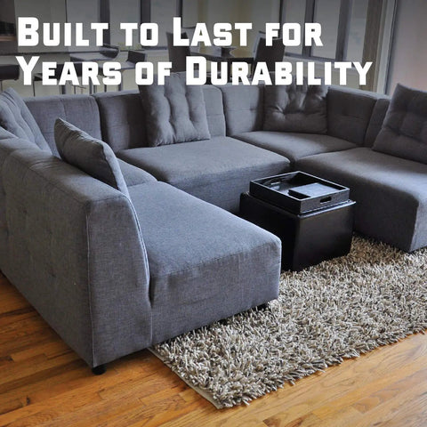 Heavy Duty Couch Connectors For Sliding Sectional Sofas 4 Pack Easy Hook And Loop Cinch Straps Universal Fit on a grey sectional sofa.