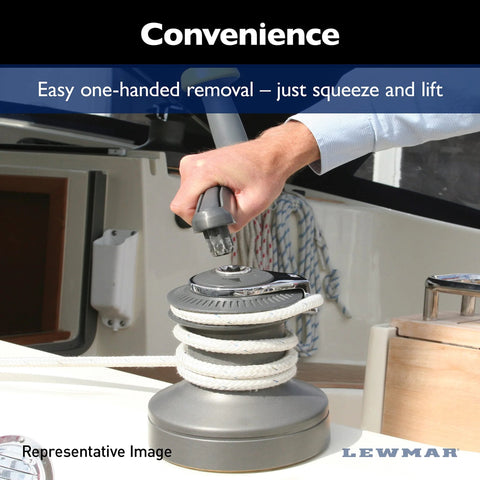 Lewmar 8-inch aluminum winch with one-touch Powergrip handle installed on deck; gray winch with white rope.