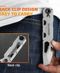 EDC pry bar multitool in silver with back-clip design, held by hand beside jeans; inset shows back-clip detail.