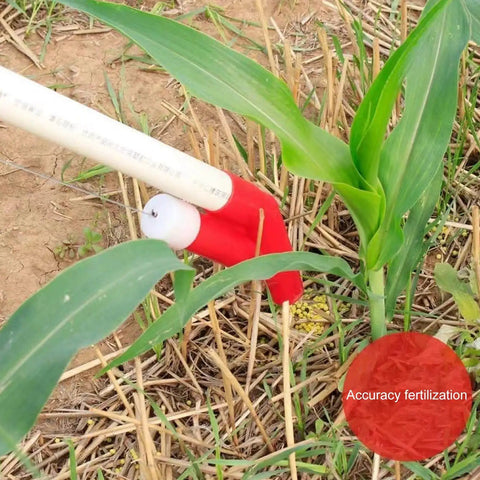Flexible Handle Manual Fertilizer Spreader With Bag For Farm Vegetables And Fruit Trees Backpack Style shown in use