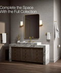 Bathroom with vertical toilet paper holder for easy access, matches components faucets and accessories, sleek wall mount