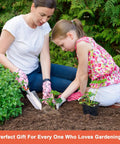Mother and daughter using Workhorse Heavy Duty Aluminum Garden Shovel With Ergonomic Handle For Digging Deep In Tough Soil