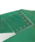 Pro T Shirt Ruler Guide For Easy Accurate Alignment Of Vinyl And Sublimation Designs On Shirts With Built In Size Chart shown on a green shirt