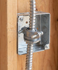 Heavy Duty 4 Set 3/4 Inch Cable Connectors For Electrical Conduit Fittings with threaded wire clamps mounted on a wooden wall.