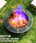 36 Inch Round Metal Fire Pit With Grill For Outdoor Yards And Patios, 3 In 1 Fire Pit Table on grass with colorful flames