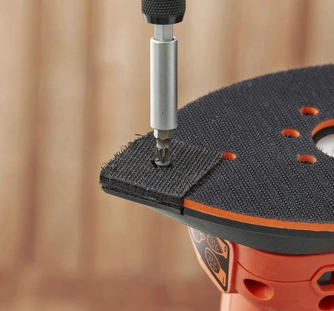 Close-up of Pick Up This Bad Boy Heavy Duty Multi Sander With 200 Watt Motor attaching sanding pad for versatile use.