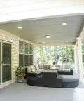 Outdoor Flush Mount LED Ceiling Light For Porches And Walkways, 4000K Cool White, Dark Bronze Exterior Fixture on a covered patio
