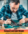 Man using Mini Heat Gun With Dual Temp 350W High Power Go To Hot Air Tool For Shrink Tubing And Embossing Crafts on circuit board