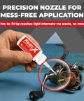 Hand applying Beefed-Up Extreme-Pressure Fishing Reel Lubricant For Gears And Bearings to fishing reel with precision nozzle