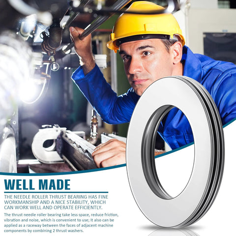Thrust needle roller bearing with washers, silver metal; 0.75 in bore, 1.25 in OD; factory worker in blue coveralls and yellow hard hat nearby