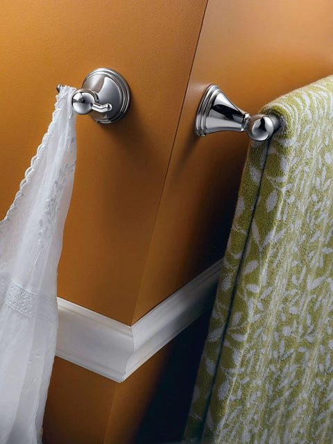 Preston Collection Chrome 24 Inch Bathroom Towel Bar Wall Mounted Towel Rack For Bath Or Kitchen, installed on an angled wall.