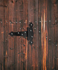 Beefed Up Heavy Duty Gate Hinges For Wood Gates T Post Hinges Black Fence Kit with Screws, 6 Inch 2 Pack on a rustic wood gate