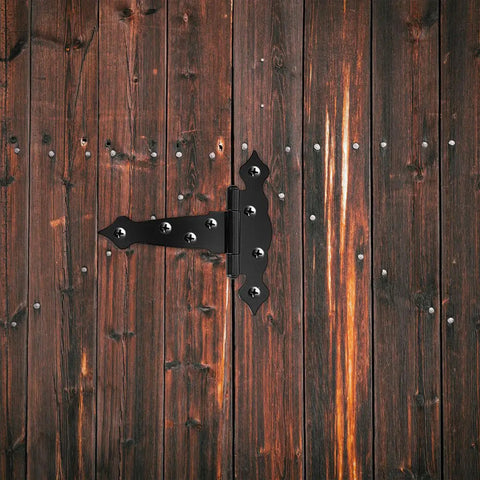 Heavy Duty Shed Door Hinges With Screws 2 Pack for Barn Doors and Outdoor Wood Gates mounted on rustic wooden door