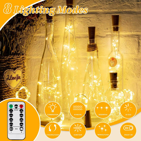 Image showing 4 Pack 80 Ft 240 LED Fairy Lights Battery Powered With Remote And Timer No Fuss 8 Modes Twinkle String Lights illuminating glass bottles.