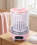 Game Changing Go Anywhere Portable Mini Washing Machine For Socks And Underwear With Hassle Free Cordless Operation Ultra Compact 3 Liter Tank on a wooden table.