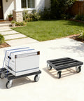 Heavy Duty Furniture Dolly With Smooth Rolling Locking Casters, Rock Solid Steel Folding Moving Platform, No Sweat Collapsible Hand Truck For Quick Sofa And Machine Moving, 1200 Lb Capacity holding stacked boxes in outdoor setting.