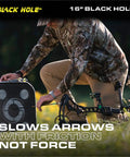 Person using Beast Four-Sided Archery Target for Crossbows, 16 by 16 by 14 inches, in outdoor setting, showing friction not force