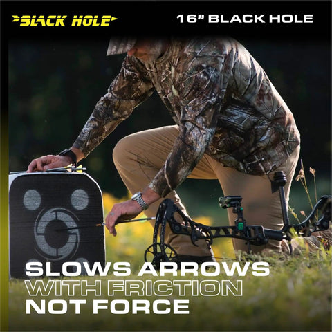 Person using Beast Four-Sided Archery Target for Crossbows, 16 by 16 by 14 inches, in outdoor setting, showing friction not force