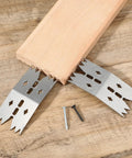 Heavy Duty Stainless Steel Bench Dogs Kit with 6 clamping dogs and 12 screws shown with a wooden plank for router sled use.