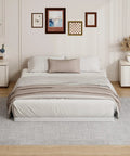 King Size 2 Inch Low Profile Box Spring Heavy Duty Bunkie Board Mattress Foundation With Fabric Cover on a bed in a stylish bedroom.