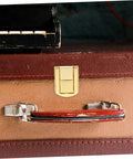 Close-up of retro style lock latch clasp kit for wooden boxes and jewelry cases secure closure hardware on vintage suitcase.