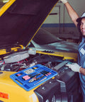 Blue Silicone Tool Tray For Auto Repairs Flexible Magnetic Tool Holder With Small Parts Tray on car hood during maintenance