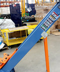 Heavy Duty Portable Two Post Car Lift With 8000 Lbs Capacity And Electric Lock Adjustable Height Up To 51 Inches showing blue and orange hoist in a warehouse.
