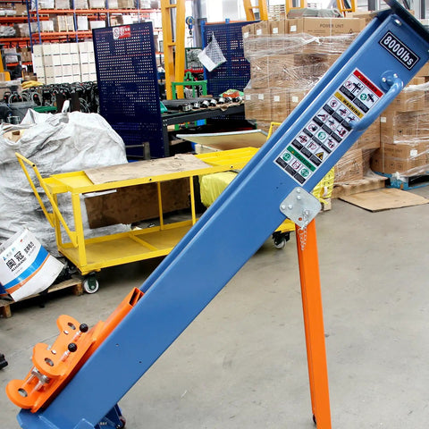 Heavy Duty Portable Two Post Car Lift With 8000 Lbs Capacity And Electric Lock Adjustable Height Up To 51 Inches showing blue and orange hoist in a warehouse.