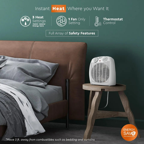 Dual Watt Personal Heater With 750 And 1500 Watts on wooden table in bedroom, fast warmth from fan forced heating
