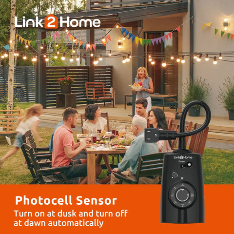 Heavy Duty Outdoor Weatherproof Dual Outlet Remote Control With Dusk To Dawn Sensor Programmable 24 Hour Timer set during a yard dinner party.