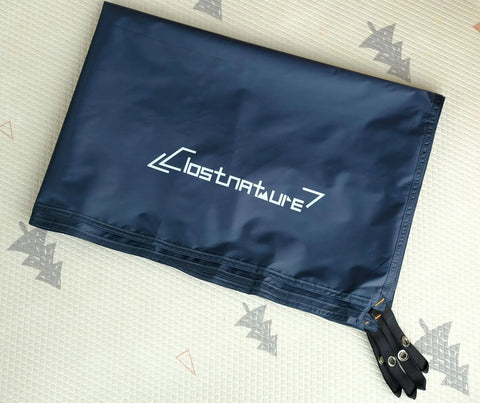 Tent Footprint Ground Cloth Waterproof Tarp Heavy Duty Tent Floor Saver displayed folded on patterned surface
