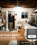 2000 Lumen Solar Shed Light With Pull Chain Switch Heavy Duty Waterproof Pendant Lamp illuminating a kitchen with baked goods.