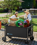 Heavy Duty Collapsible Wagon Cart With 29.3 Inch Body 150L Capacity And 260 Lb Load Beastly Rolling Cart For Garden Groceries Sports Gear Camping Black in use for gardening.